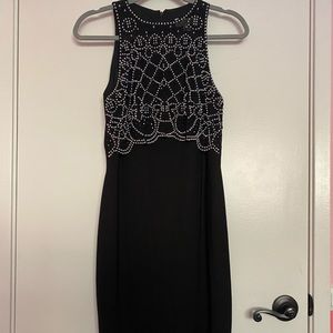 black mini dress with gemstones